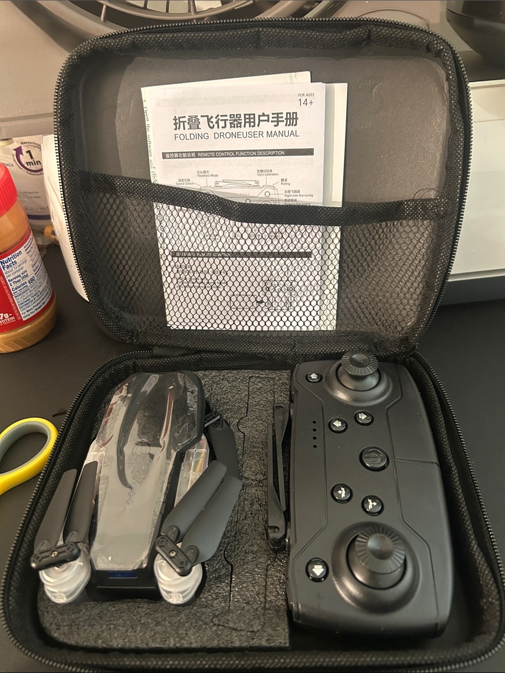 Compact Foldable Black Drone with Remote Controller